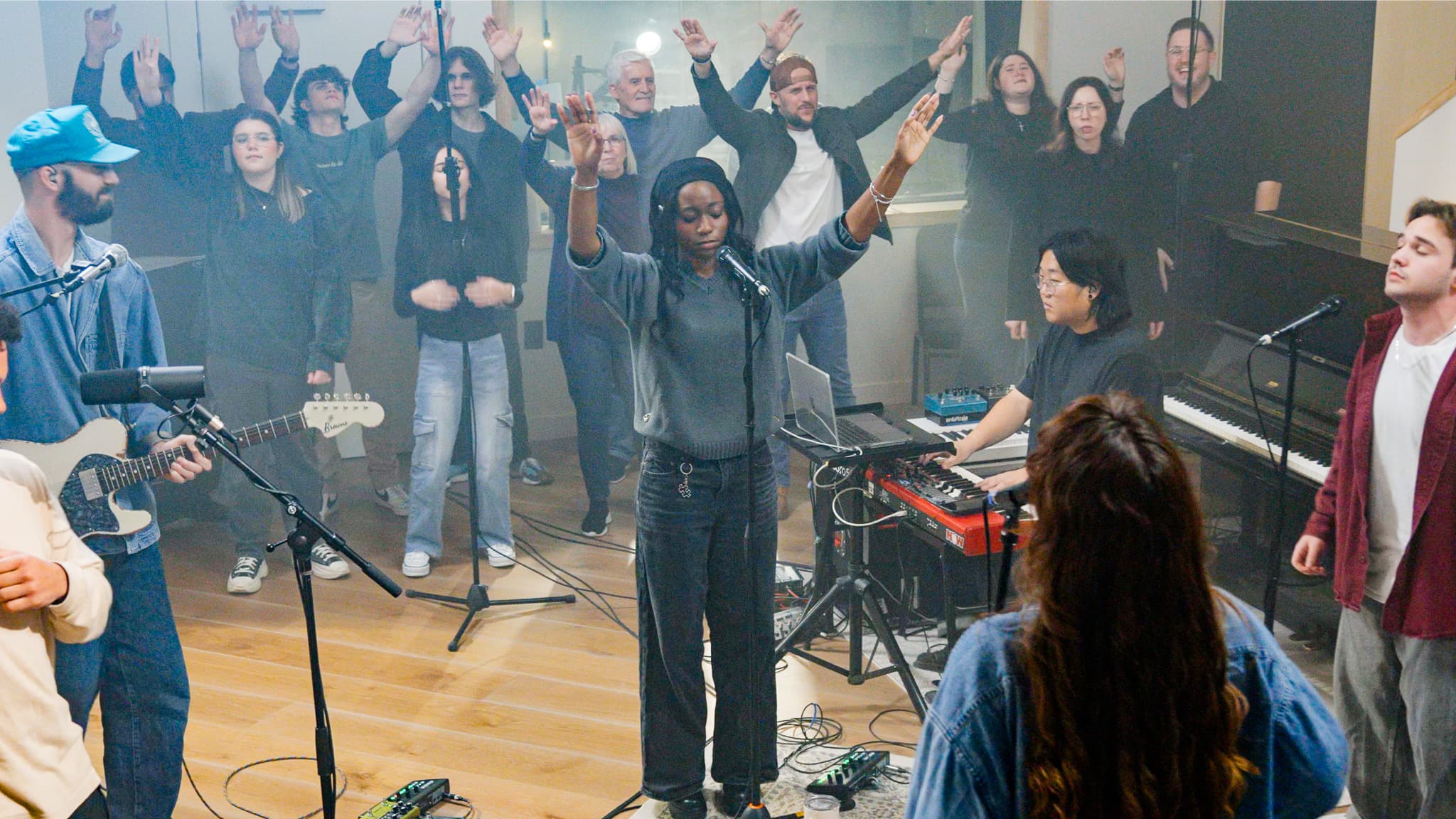 Good News Collective in worship